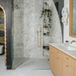 Tineke Triggs Interiors | Calacatta Caldia Honed Marble (Shower and Vanity Top) | Photo by Christopher Stark Slab