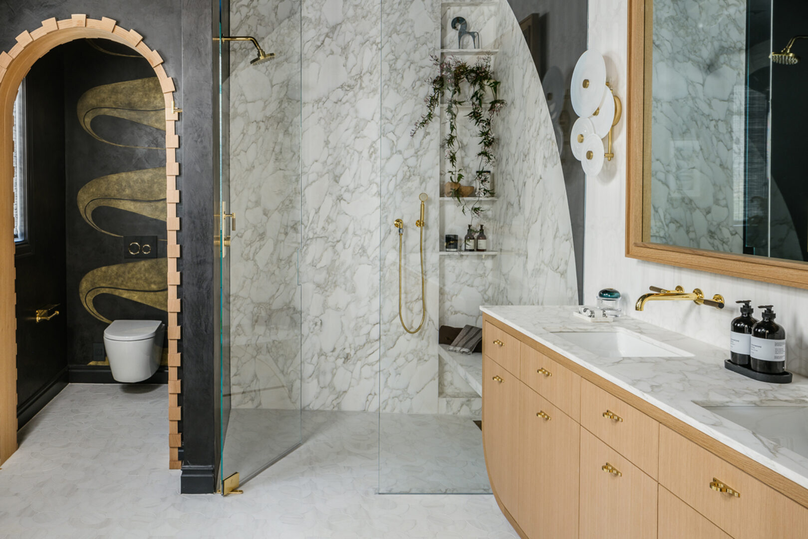 Tineke Triggs Interiors | Calacatta Caldia Honed Marble (Shower and Vanity Top) | Photo by Christopher Stark Slab