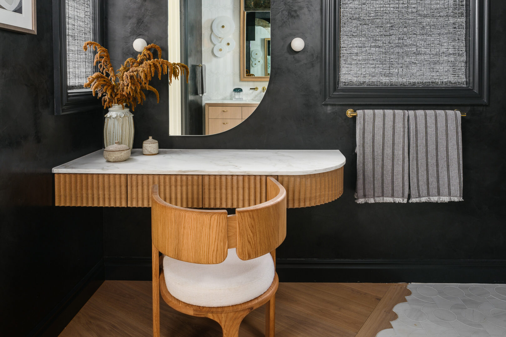Tineke Triggs Interiors | Calacatta Caldia Honed Marble (Vanity Top) | Photo by Christopher Stark Slab