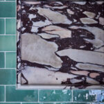 Designer: Lark + Palm | Photographer: John Merkl | Materials: Micro Moons Black Stone Mosaic, Calacatta Viola Marble, Café Morocccan Mint Tile Slab