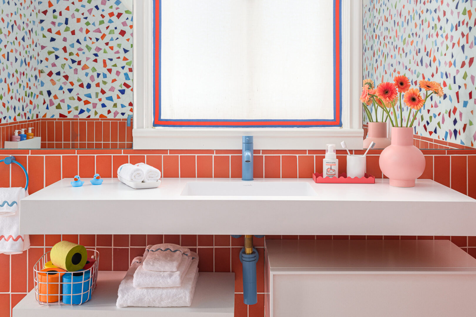 EJ Interior Design | New Ravenna Memphis Jewel Glass Mosaic & McIntyre 3x8 Glazed Ceramic Tile in Melon | Photo by Christopher Stark Slab