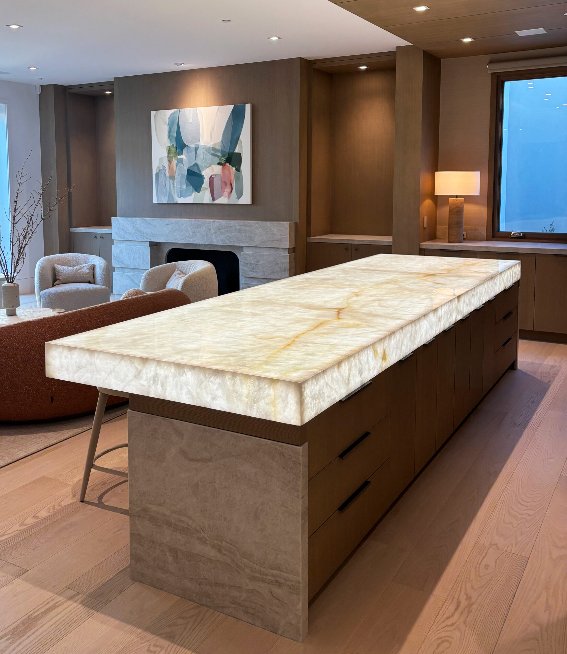 Architect, Designer & Builder: PPG | Materials: Quartzite Bianco (bar top), Taj Mahal (counter, bar base, fireplace)