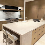 Architect, Designer & Builder: PPG | Materials: Calacatta Lincoln (backsplash), Corinthian Beige (island) Slab