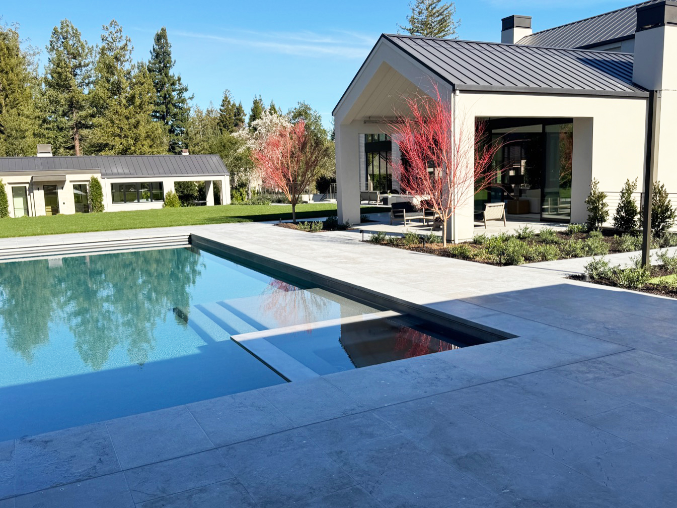 Architect, Designer & Builder: PPG | Material: Seville Flamed & Brushed Slab