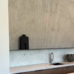 Architect, Designer & Builder: PPG | Materials: Dama Bianca & Creme Du Provence Fluted