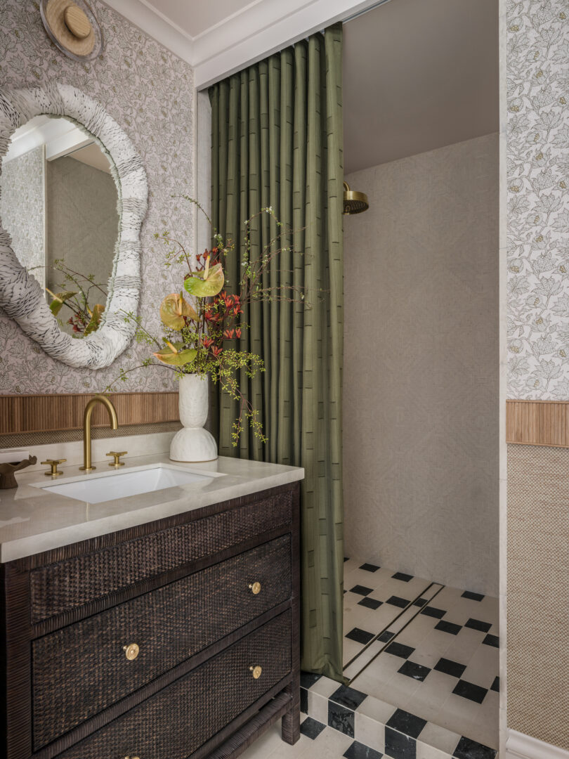 Designer: Kendra Nash | Photographer: Christopher Stark | Materials: Siena Beige Agarwood Limestone Tumbled Mosaic, Agarwood Limestone Honed, Omega Black Brushed & Pollowed Edge Slab