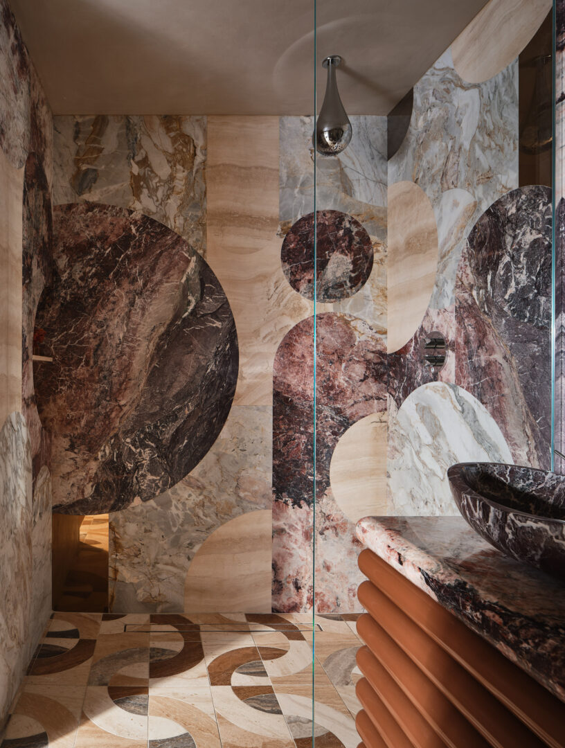 Designer: Sabah Mansoor | Photographer: Brad Knipstein | Materials: Cherry Blossoms Polished Marble, Leroy Soleil Honed Marble, Alabastrino Leathered Marble Slab