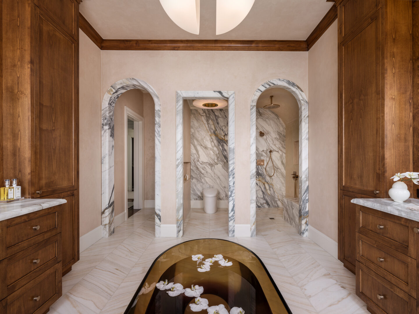 Designer: Lauren Berry | Photographer: Christopher Stark | Materials: Calacatta Borghini Honed Marble, Vanilla Onyx Vein Cut Honed Chevron Slab