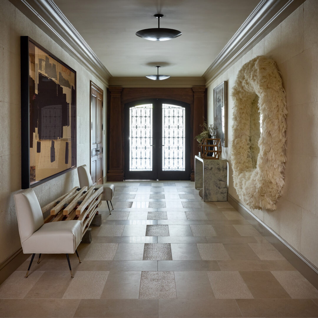 Designer: Jon de la Cruz | Photographer: John Merkl | Materials: Corton Beige Honed & Linen Limestone Slab