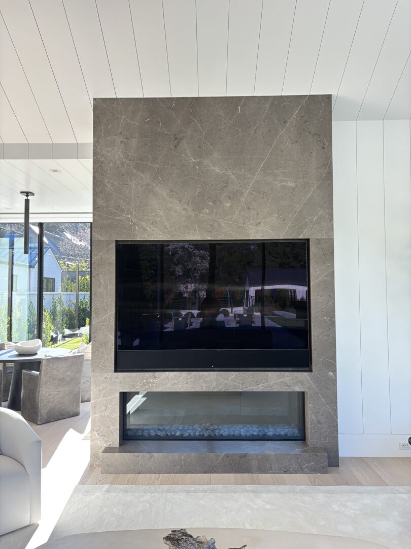 Architect, Designer & Builder: PPG | Material: Grigio Perla Slab