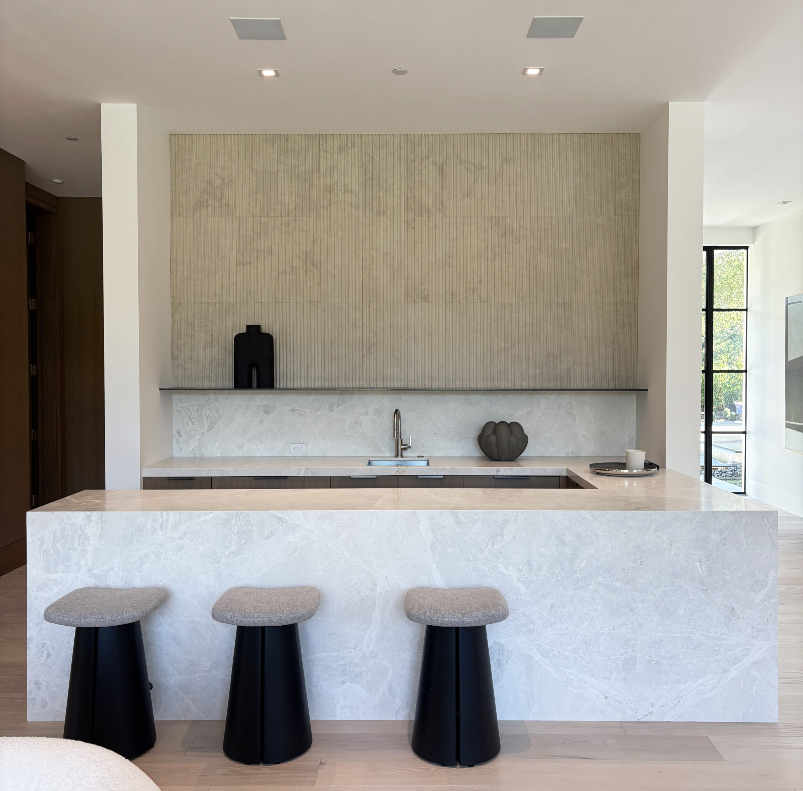 Architect, Designer & Builder: PPG | Materials: Dama Bianca & Creme Du Provence Fluted Tile