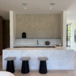 Architect, Designer & Builder: PPG | Materials: Dama Bianca & Creme Du Provence Fluted Slab