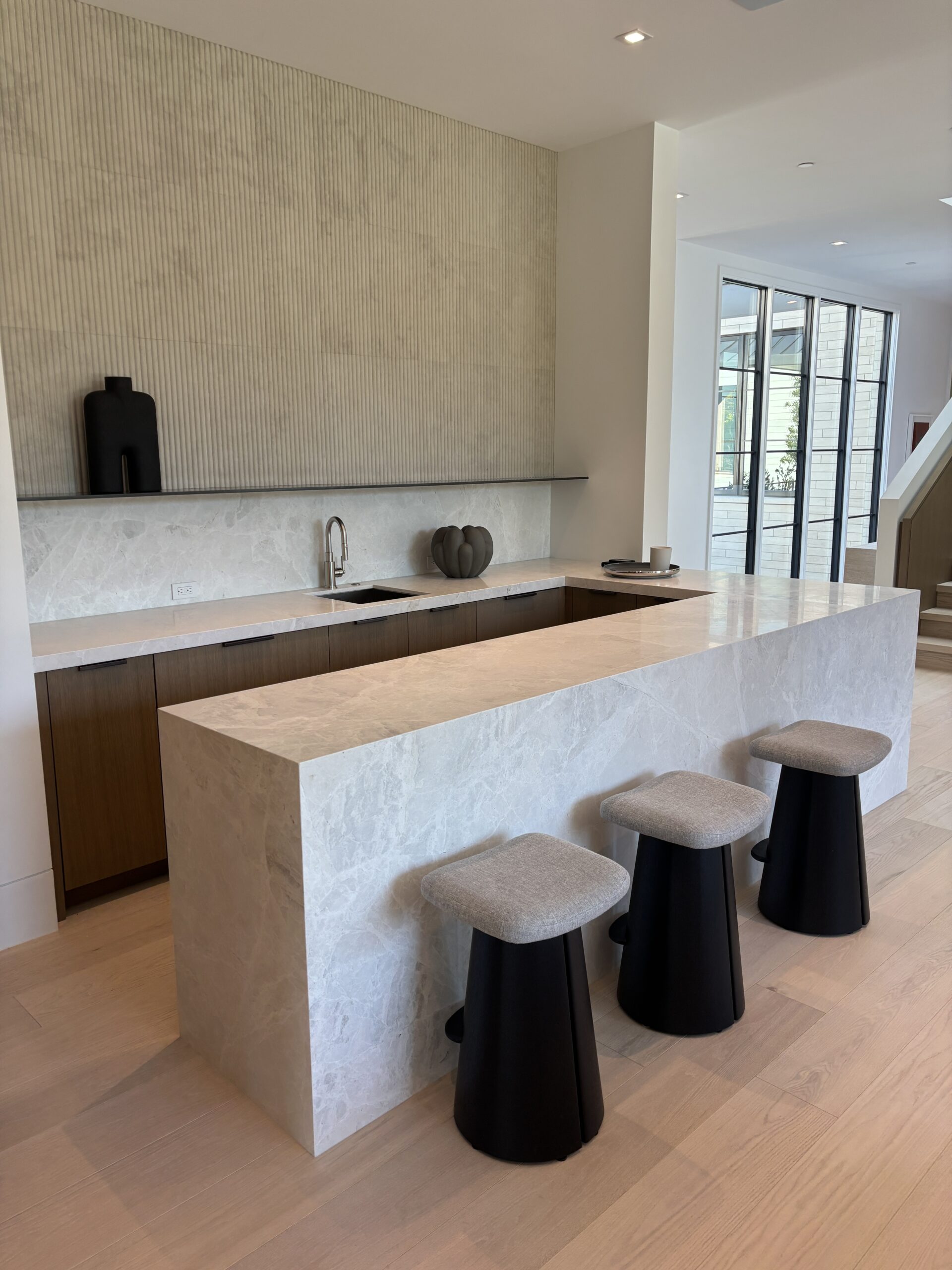 Architect, Designer & Builder: PPG | Materials: Dama Bianca & Creme Du Provence Fluted