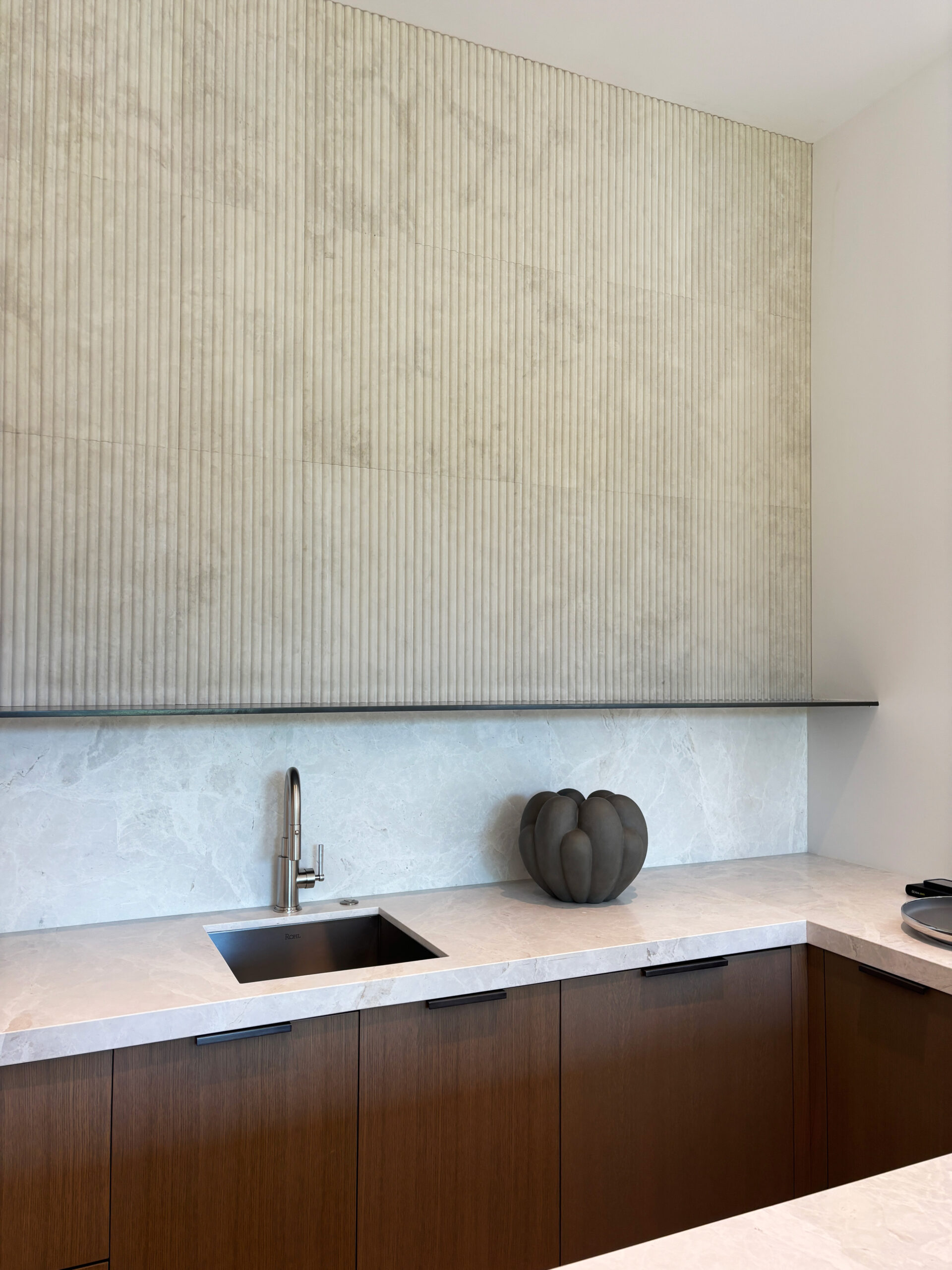 Architect, Designer & Builder: PPG | Materials: Dama Bianca & Creme Du Provence Fluted Tile