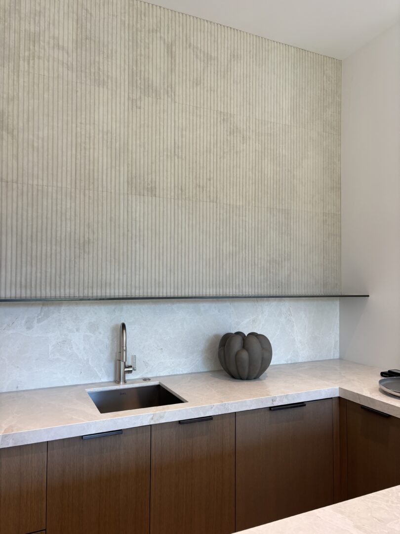 Architect, Designer & Builder: PPG | Materials: Dama Bianca & Creme Du Provence Fluted Slab