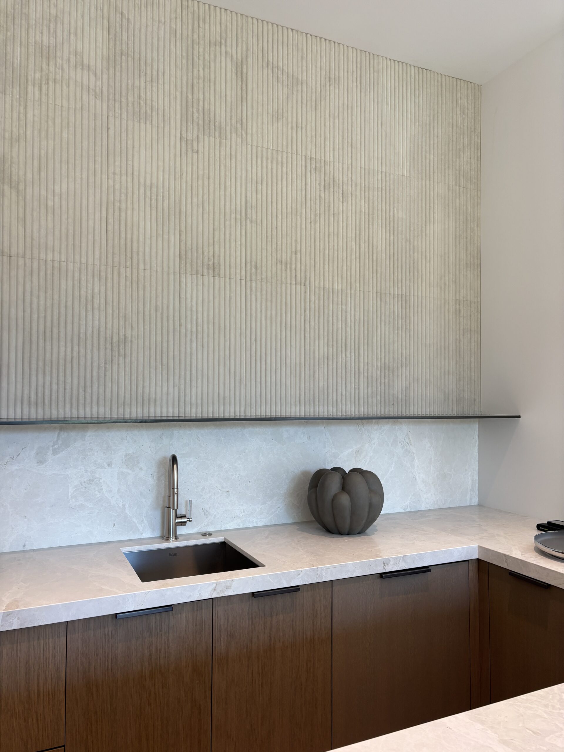 Architect, Designer & Builder: PPG | Materials: Dama Bianca & Creme Du Provence Fluted