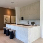 Architect, Designer & Builder: PPG | Materials: Dama Bianca & Creme Du Provence Fluted Tile Slab