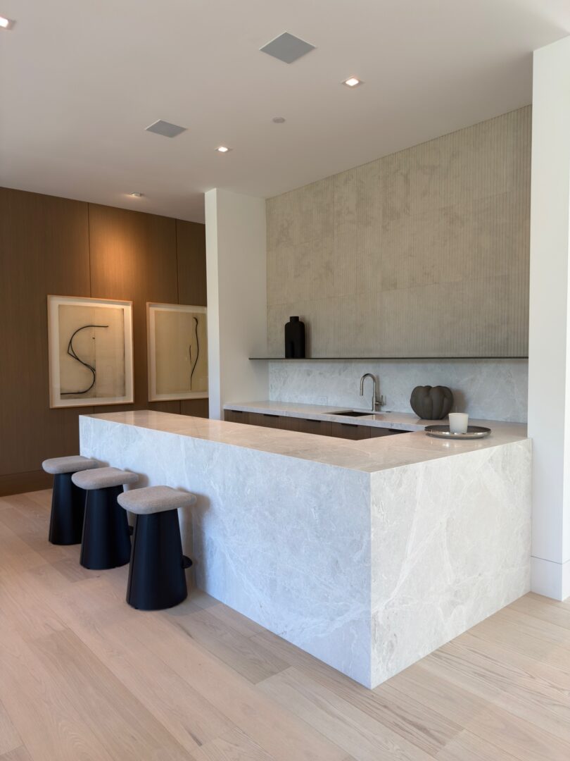 Architect, Designer & Builder: PPG | Materials: Dama Bianca & Creme Du Provence Fluted Tile Slab