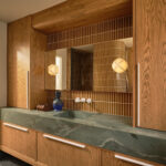 Designer: AubreyMaxwell Design & Perez Construction | Photographer: R. Brad Knipstein | Materials: Quartzite Verdevivo (countertop); Zedonia Terrazza by Sonoma Tilemakers (floor & side panel); Essential Collection Tiles in Dijon by McIntyre Tile (shower walls & backsplash) Slab
