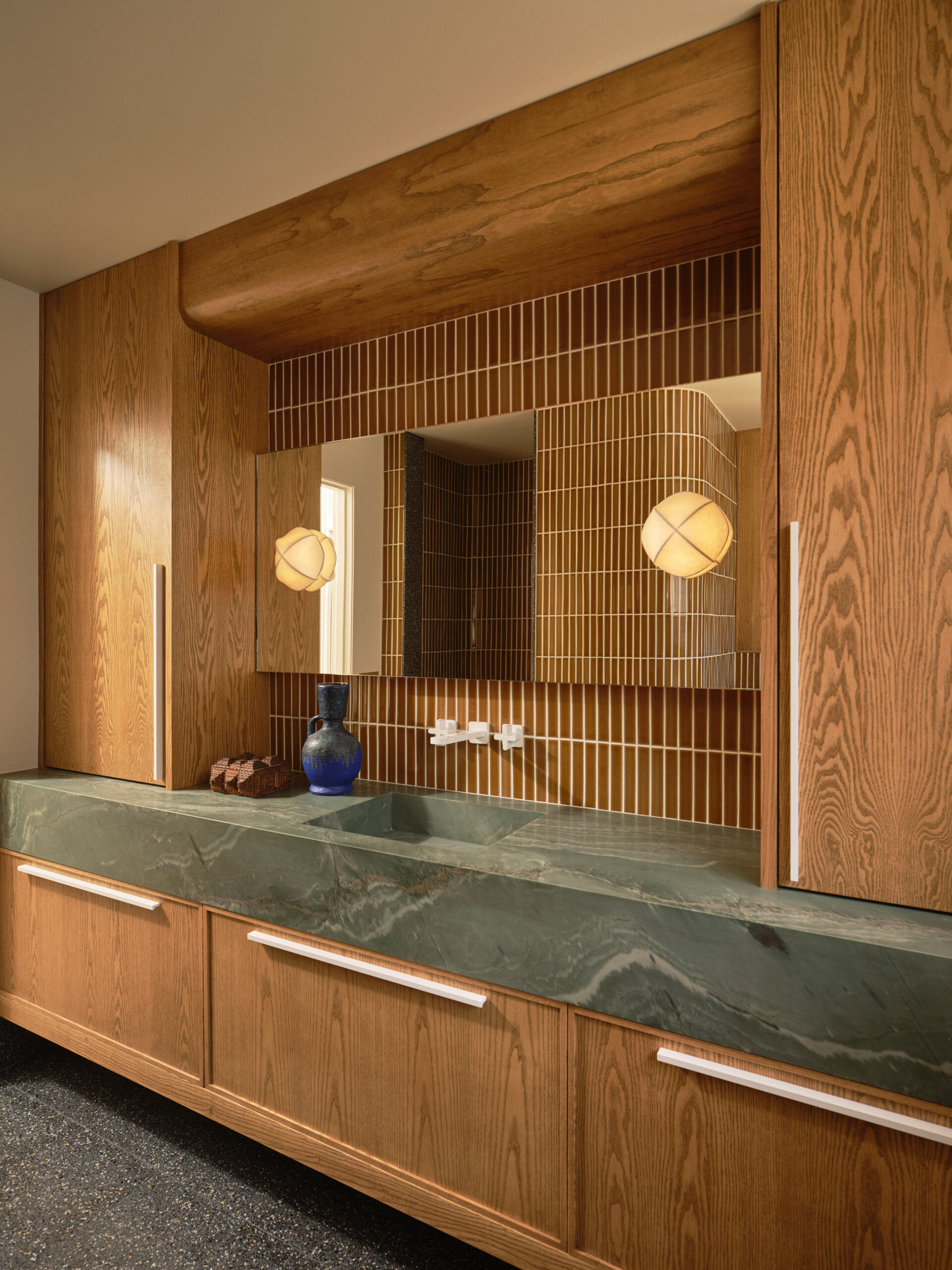 Designer: AubreyMaxwell Design & Perez Construction | Photographer: R. Brad Knipstein | Materials: Quartzite Verdevivo (countertop); Zedonia Terrazza by Sonoma Tilemakers (floor & side panel); Essential Collection Tiles in Dijon by McIntyre Tile (shower walls & backsplash)