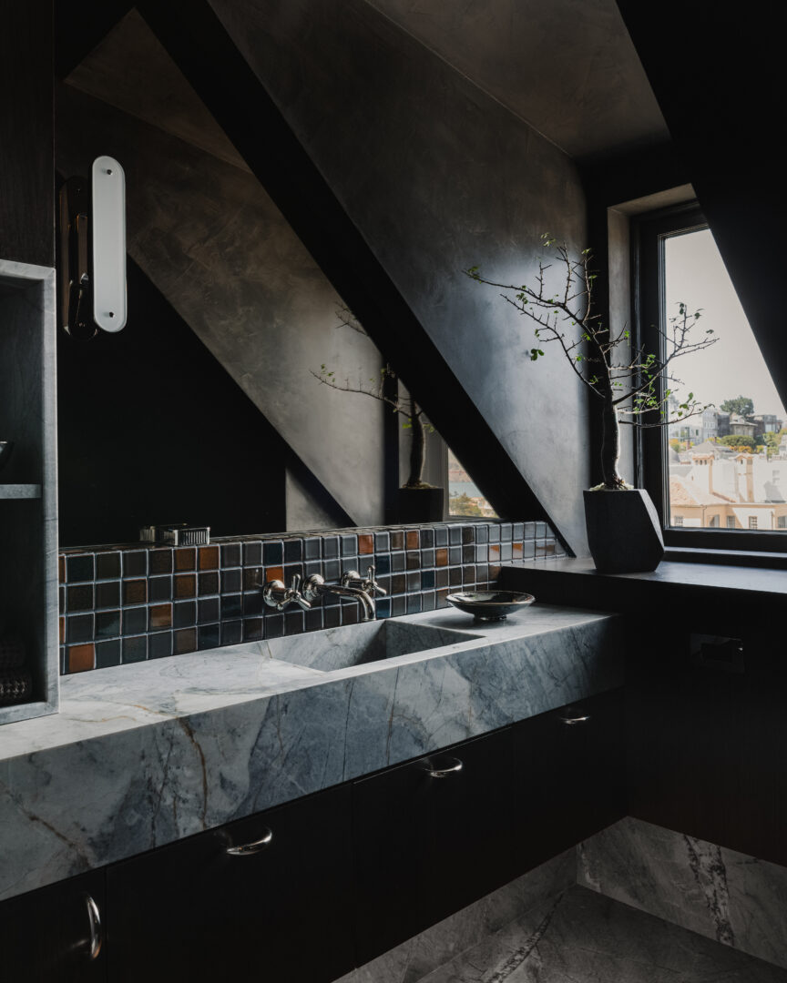 Designer: Studio Alexander | Photographer: Dane Deaner | Contractor: Cliff Point Construction | Materials: Ijen Blue Quartzite, McIntyre Essential Collection in Tenmoblue and Charcoal Slab