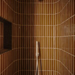 Designer: AubreyMaxwell Design & Perez Construction | Photographer: R. Brad Knipstein | Material: Essential Collection Tiles in Dijon by McIntyre Tile (shower walls & backsplash) Slab