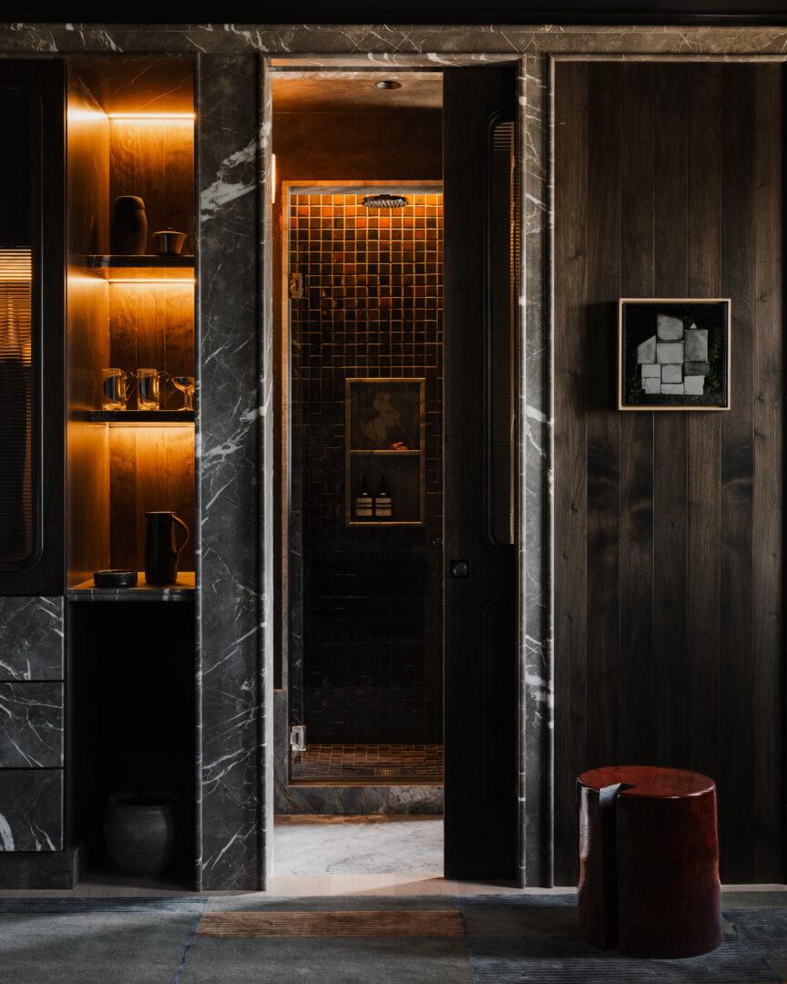 Designer: Studio Alexander | Photographer: Dane Deaner | Contractor: Cliff Point Construction | Materials: Collemandina Marble, McIntyre Essential Collection in Tenmoblue and Charcoal Slab