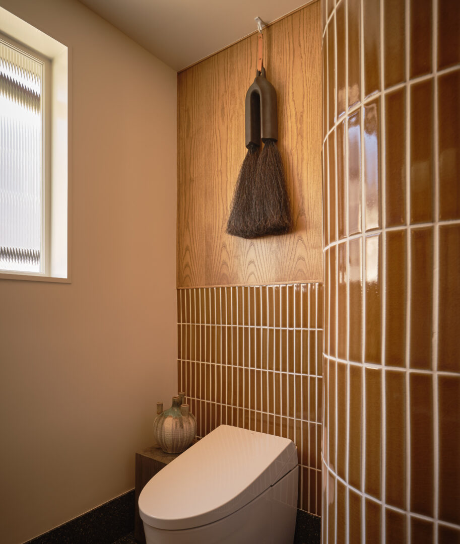 Designer: AubreyMaxwell Design & Perez Construction | Photographer: R. Brad Knipstein | Materials: Essential Collection Tiles in Dijon by McIntyre Tile (shower walls & backsplash); Zedonia Terrazza by Sonoma Tilemakers (floor) Slab