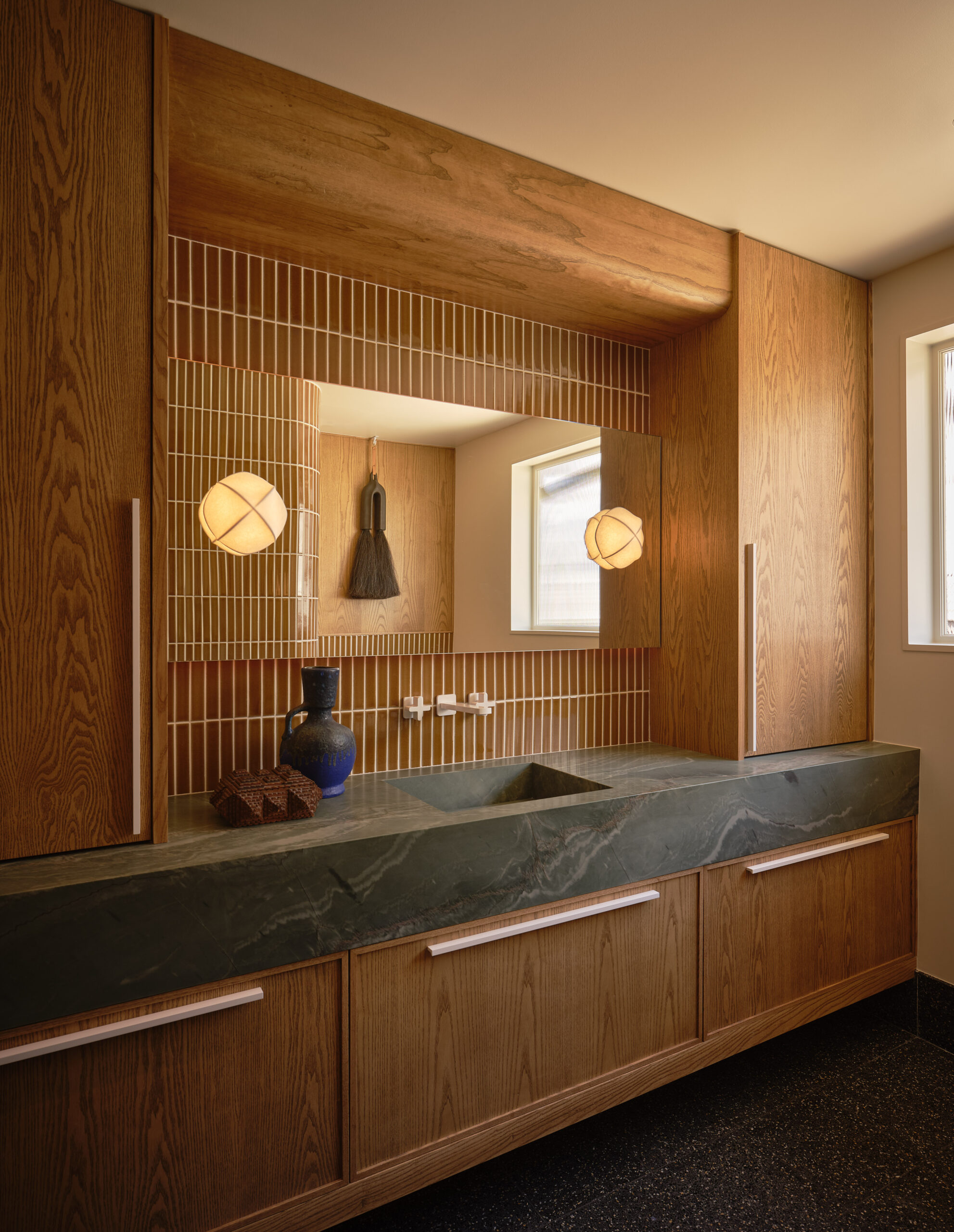 Designer: AubreyMaxwell Design & Perez Construction | Photographer: R. Brad Knipstein | Materials: Quartzite Verdevivo (countertop); Zedonia Terrazza by Sonoma Tilemakers (floor & side panel); Essential Collection Tiles in Dijon by McIntyre Tile (shower walls & backsplash)
