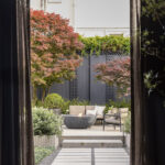 Designer: Martinelli Design | Photographer: Paul Dyer | Young and Burton | Materials: Ceppo Di Gre Limestone, Seville Limestone, Como Taupe Limestone, Indiana Limestone, Ivory & Silver Travertine Veneer